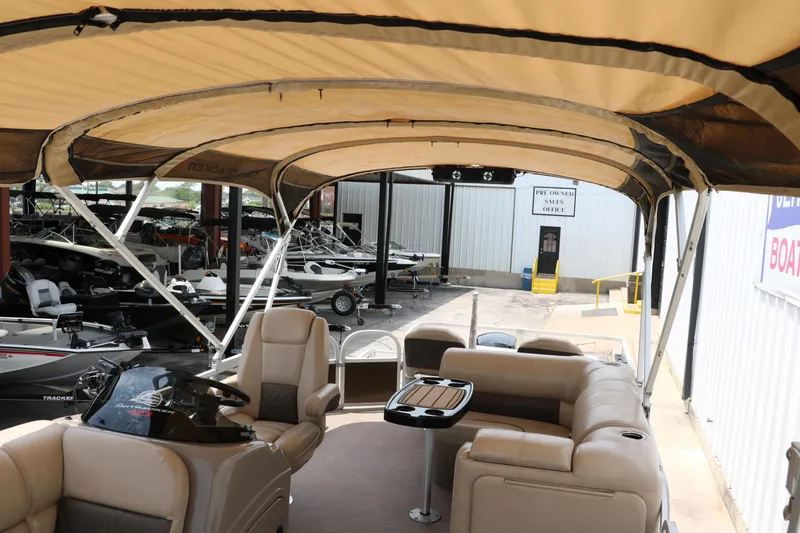 Slide: The Image of Interior view of 2020 Sun Tracker SportFish 22 XP3 pontoon boat with seating and canopy. - 17