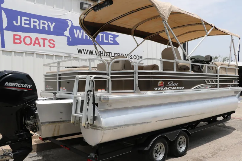 Slide: The Image of 2020 Sun Tracker SportFish 22 XP3 pontoon boat with Mercury engine at Jerry Whittle Boats dealership. - 2