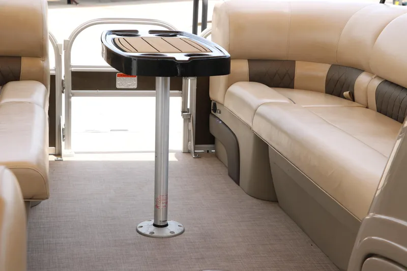 Slide: The Image of Interior of 2020 Sun Tracker SportFish 22 XP3 pontoon boat with seating and table. - 27