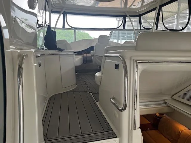 Slide: The Image of 2005 Carver 46 Motor Yacht interior with sleek seating and modern design. - 7