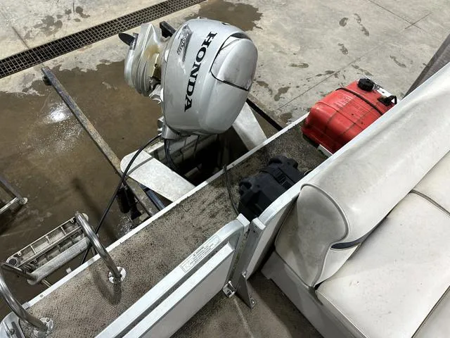 Slide: The Image of Pontoon boat with Honda outboard motor and fuel tank, Premier 2023 Island Leisure model. - 15