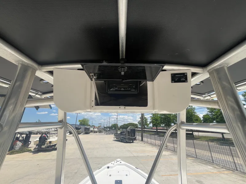 Slide: The Image of 2010 Sea Hunt 21 XP boat console with T-top and electronics. - 15