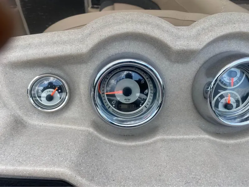 Slide: The Image of Dashboard gauges of a 2017 Avalon GS2185 boat, featuring RPM and fuel indicators. - 10