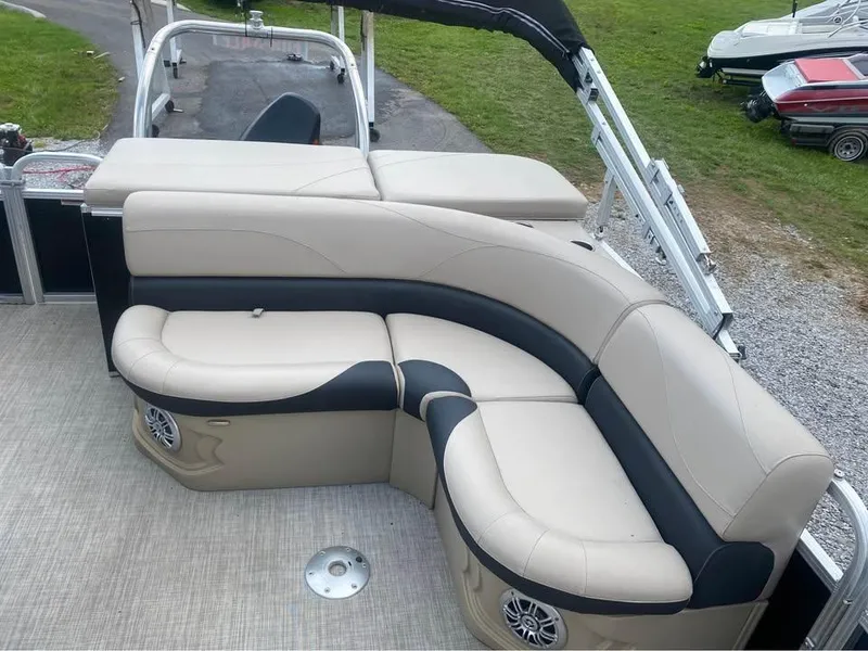 Slide: The Image of Luxurious seating on 2017 Avalon GS2185 boat, featuring beige and black upholstery. - 5