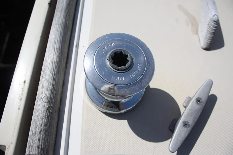 Slide: The Image of Winch and cleat on 1981 O'Day 34 sailboat deck. - 29