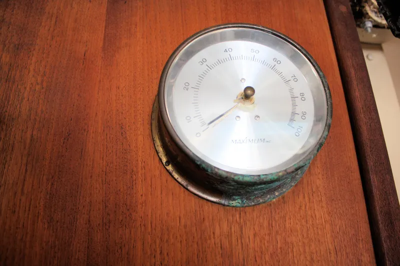 Slide: The Image of Vintage barometer on wooden panel, O'Day 34 sailboat, 1981 model. - 38
