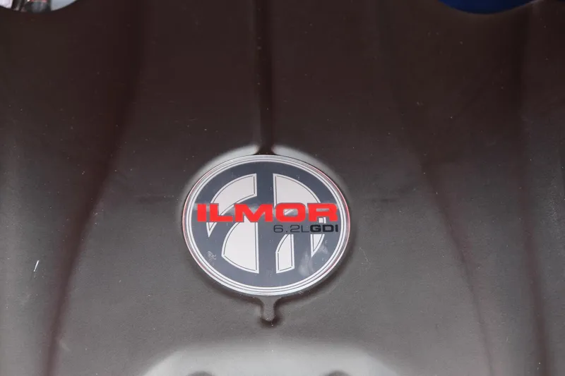 Slide: The Image of Ilmor 6.2L GDI engine emblem on 2025 MasterCraft X24 boat. - 38