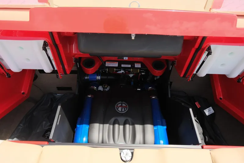 Slide: The Image of 2025 MasterCraft X24 engine compartment with red and blue components. - 39