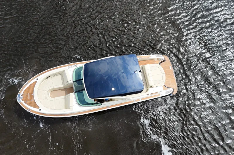 Slide: The Image of 2020 Chris-Craft Launch 31 GT boat on water, aerial view. - 102