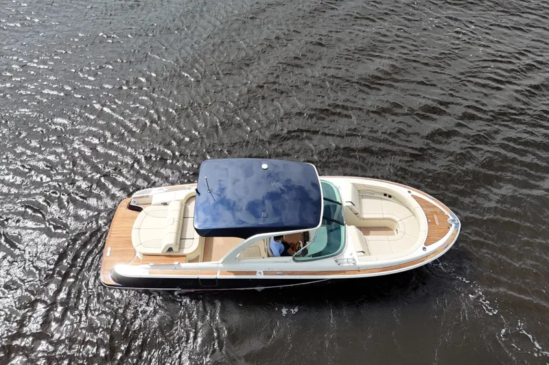 Slide: The Image of 2020 Chris-Craft Launch 31 GT boat on water, aerial view. - 103