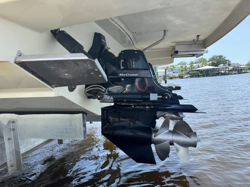 Slide: The Image of 2020 Chris-Craft Launch 31 GT boat with MerCruiser engine, docked by the water. - 111