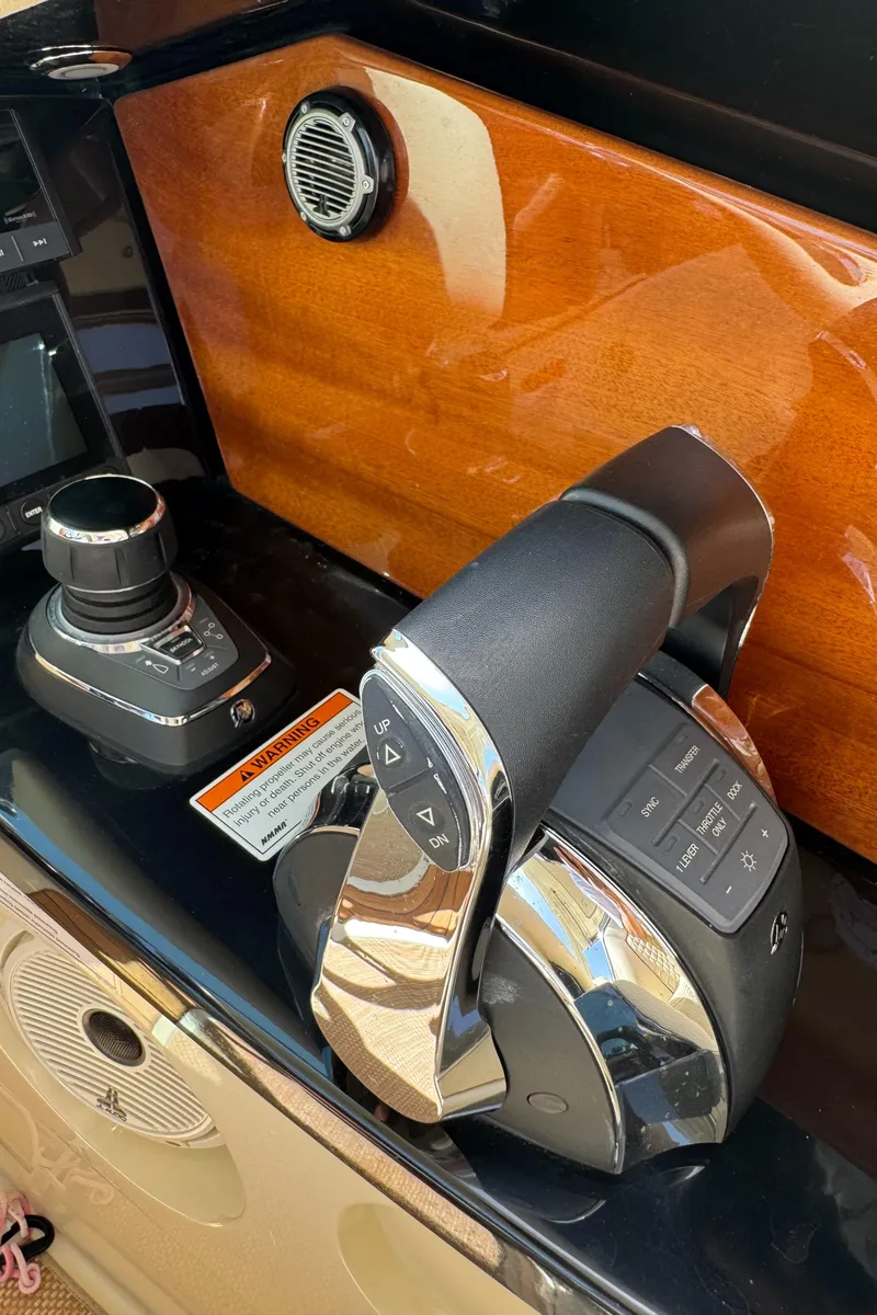 Slide: The Image of 2020 Chris-Craft Launch 31 GT boat interior with luxurious seating and helm. - 50