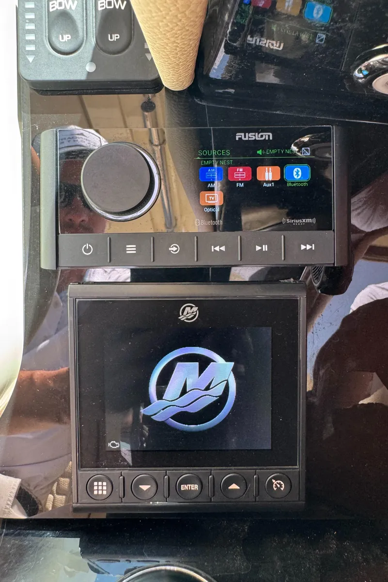 Slide: The Image of Luxurious seating area on 2020 Chris-Craft Launch 31 GT boat with American flag. - 69