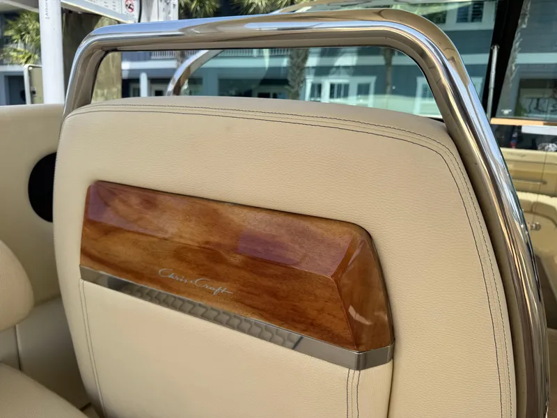 Slide: The Image of 2020 Chris-Craft Launch 31 GT boat seat with elegant wood and metal detailing. - 81