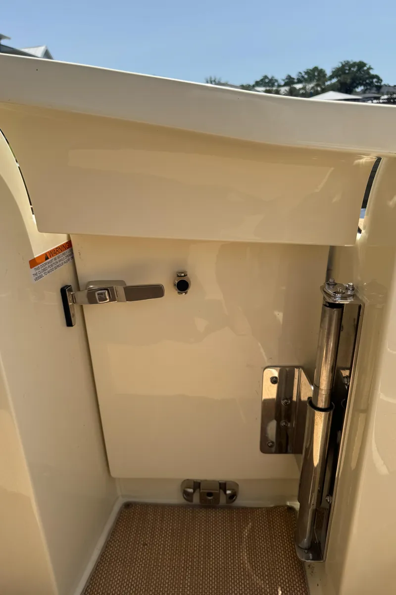 Slide: The Image of 2020 Chris-Craft Launch 31 GT boat interior detail with stainless steel hardware. - 85