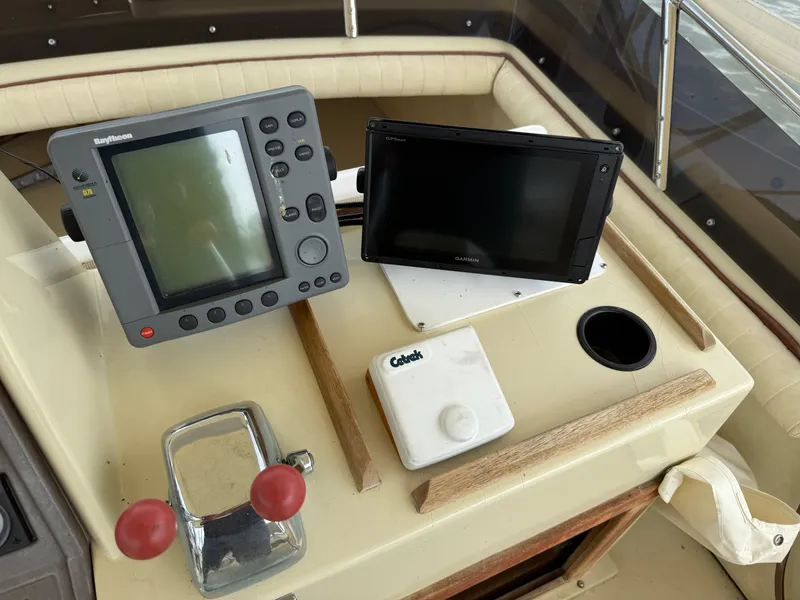 Slide: The Image of Control panel of a 1985 Trojan F36 boat with navigation equipment. - 28