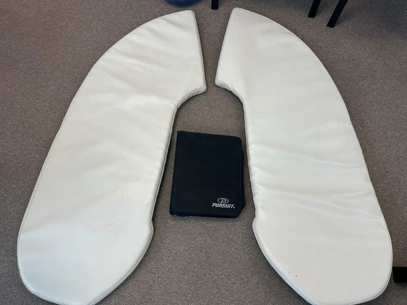 Slide: The Image of Cushions for 2005 Pursuit 2570 Center Console boat on carpeted floor. - 23