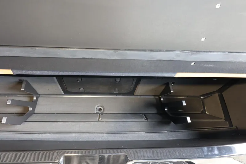 Slide: The Image of 2025 Tigé Ultré 25ZX storage compartment, showcasing spacious interior design. - 13