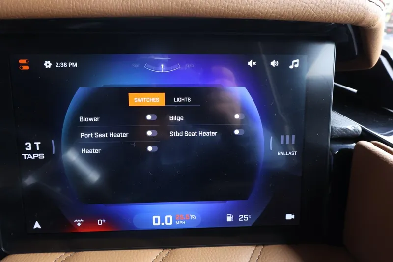 Slide: The Image of Touchscreen control panel in 2025 Tigé Ultré 25ZX boat, displaying switches and settings. - 34