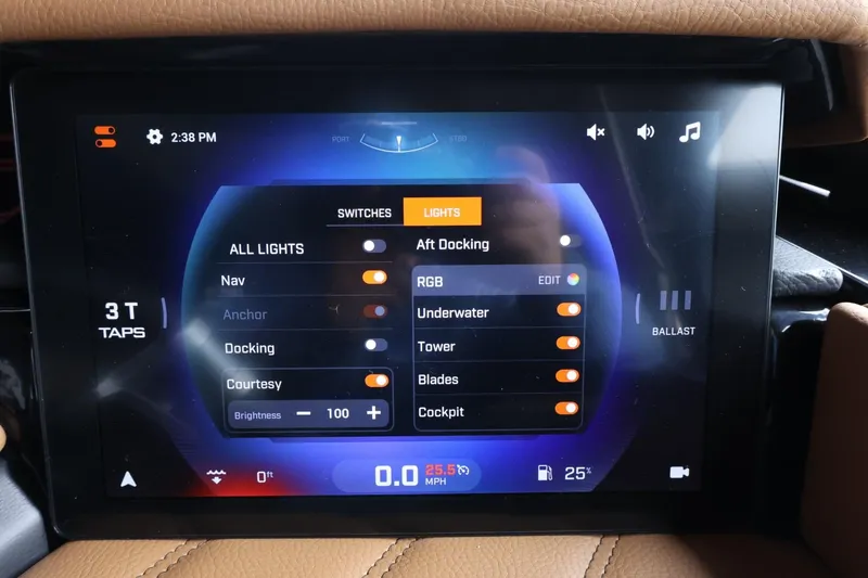 Slide: The Image of Touchscreen control panel in 2025 Tigé Ultré 25ZX boat, displaying lighting and switch options. - 35