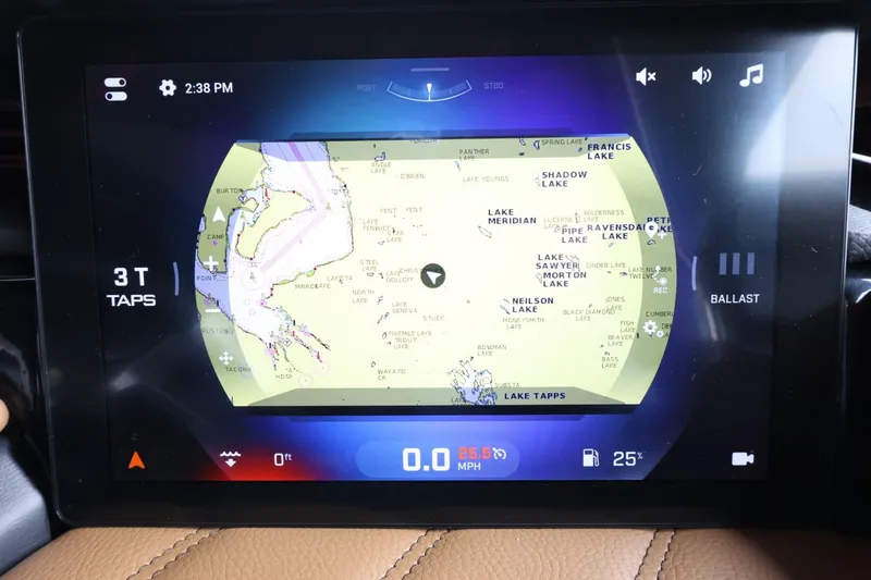 Slide: The Image of 2025 Tigé Ultré 25ZX touchscreen display showing navigation map and controls. - 36