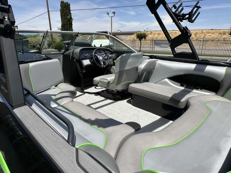 Slide: The Image of 2024 Sanger V215 S boat interior with modern seating and sleek design. - 14