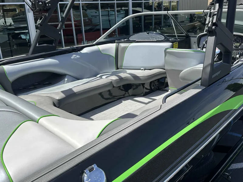 Slide: The Image of 2024 Sanger V215 S boat interior with sleek gray and green seating design. - 5