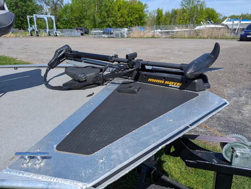 Slide: The Image of 2013 Tracker Pro 170 boat with Minn Kota Edge trolling motor on trailer. - 12