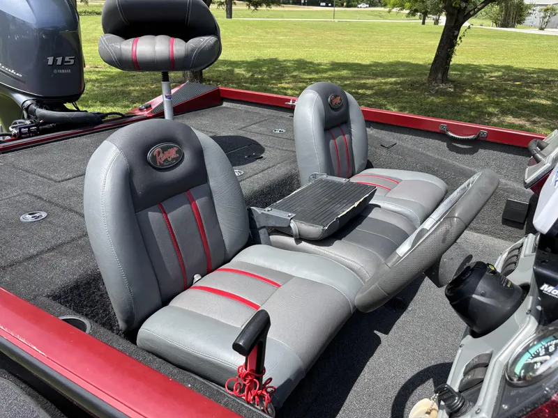 Slide: The Image of 2015 Ranger RT188 boat interior with gray and red seats, Yamaha 115 engine visible. - 8