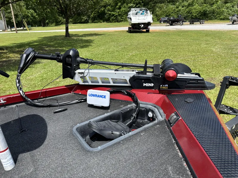 Slide: The Image of 2015 Ranger RT188 boat with Minn Kota trolling motor and Lowrance electronics on grassy area. - 9
