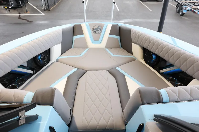 Slide: The Image of 2022 Tigé 25ZX boat interior with luxurious seating and modern design. - 16