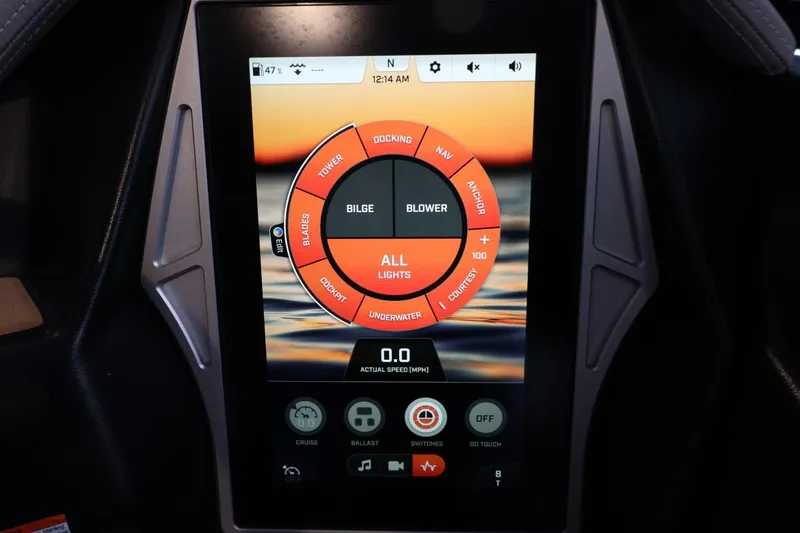 Slide: The Image of Touchscreen control panel of 2022 Tigé 25ZX boat, displaying various operational settings. - 29