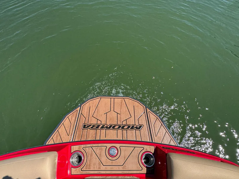 Slide: The Image of 2022 Moomba Makai boat deck on water, showcasing sleek design and craftsmanship. - 25