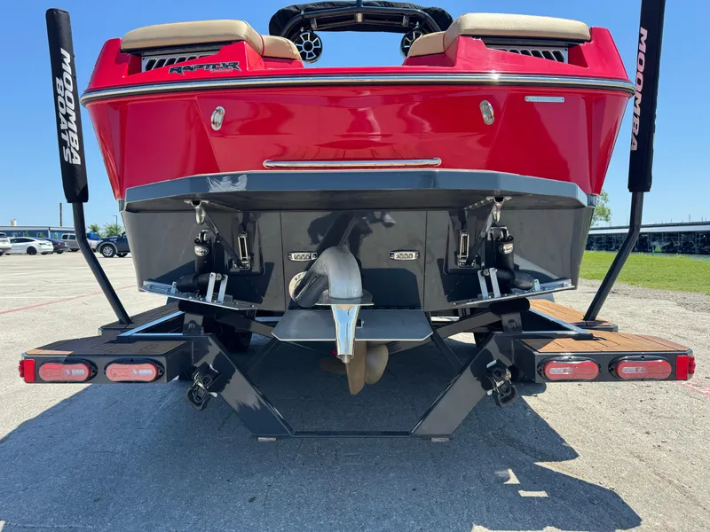 Slide: The Image of 2022 Moomba Makai boat rear view, showcasing propeller and swim platform. - 9