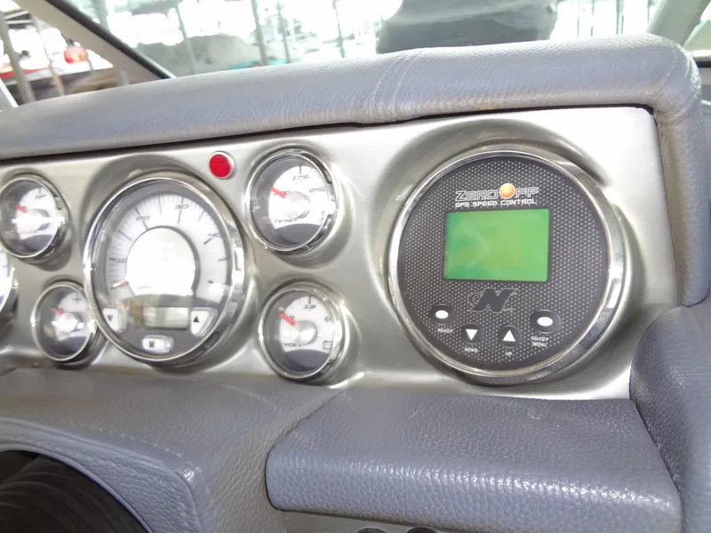 Slide: The Image of 2008 Correct Craft Super Air Nautique 230 interior with yellow and white upholstery. - 23