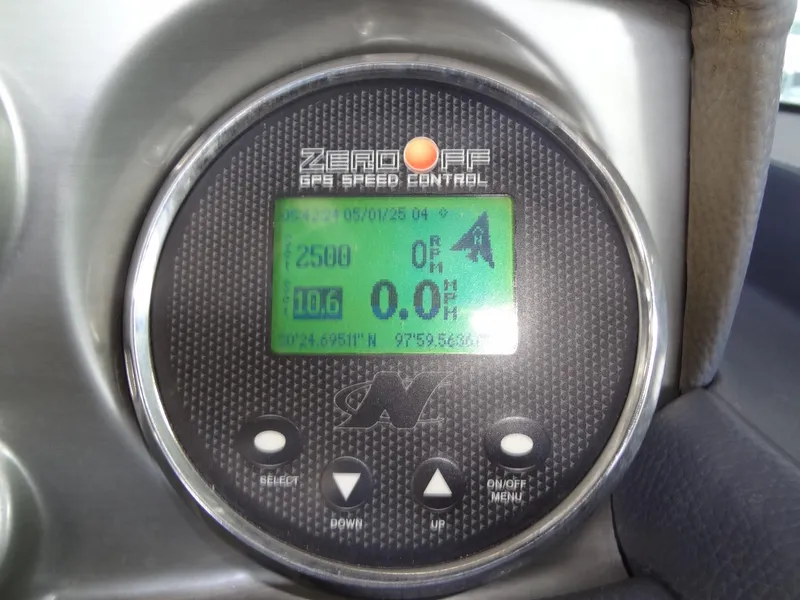 Slide: The Image of 2008 Correct Craft Super Air Nautique 230 interior seating with yellow accents and cup holder. - 24