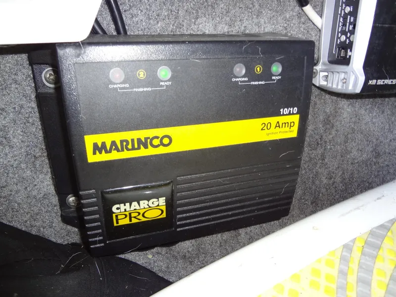 Slide: The Image of 2008 Correct Craft Super Air Nautique 230 dashboard with steering wheel and gauges. - 30