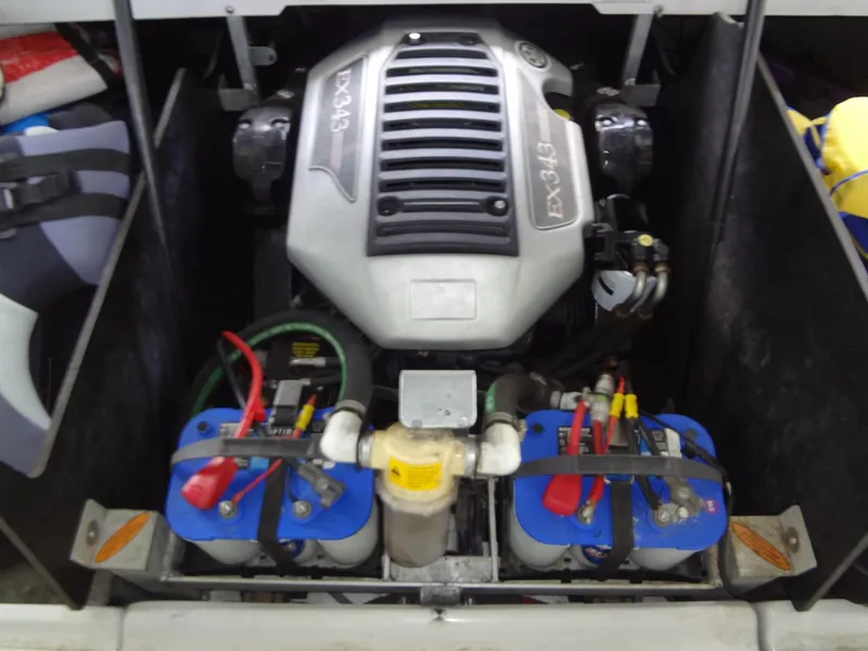 Slide: The Image of 2008 Correct Craft Super Air Nautique 230 engine compartment with dual batteries. - 39
