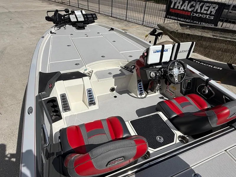 Slide: The Image of 2021 Ranger Z521L Intracoastal boat with red seats and advanced navigation equipment. - 14