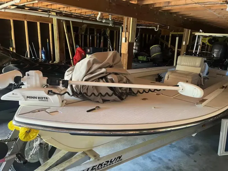 Slide: The Image of 2013 Beavertail 18 STRIKE boat with Minn Kota Terrova motor in a garage. - 4