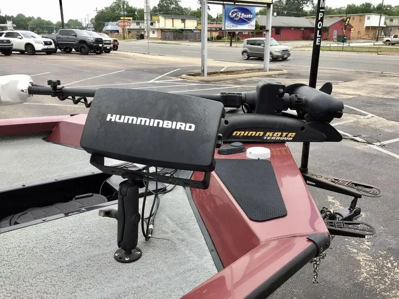 Slide: The Image of 2020 G3 1710 SPORTSMAN boat with Humminbird and Minn Kota accessories in parking lot. - 13