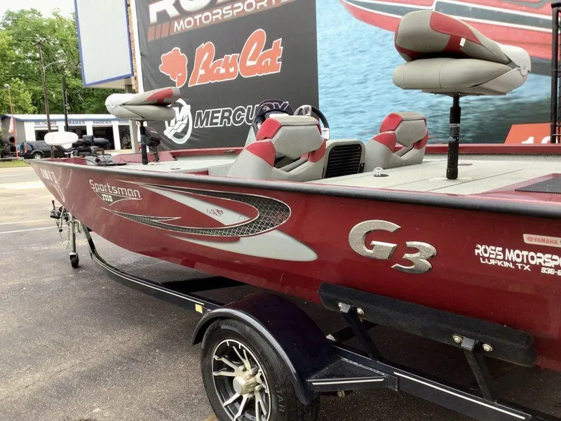 Slide: The Image of 2020 G3 1710 SPORTSMAN boat in red, parked at Ross Motorsport, featuring comfortable seating. - 20