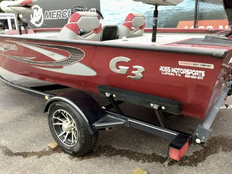 Slide: The Image of Red 2020 G3 1710 SPORTSMAN boat on trailer, displayed at Ross Motorsports. - 21