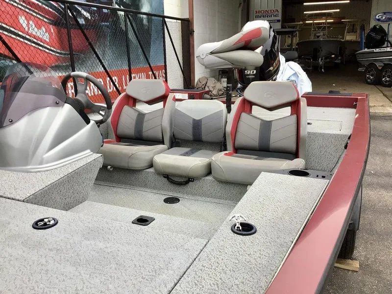 Slide: The Image of 2020 G3 1710 SPORTSMAN boat interior with three seats and Yamaha motor. - 22