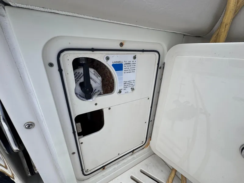 Slide: The Image of Boston Whaler 345 Conquest 2015 livewell control panel on boat deck. - 19