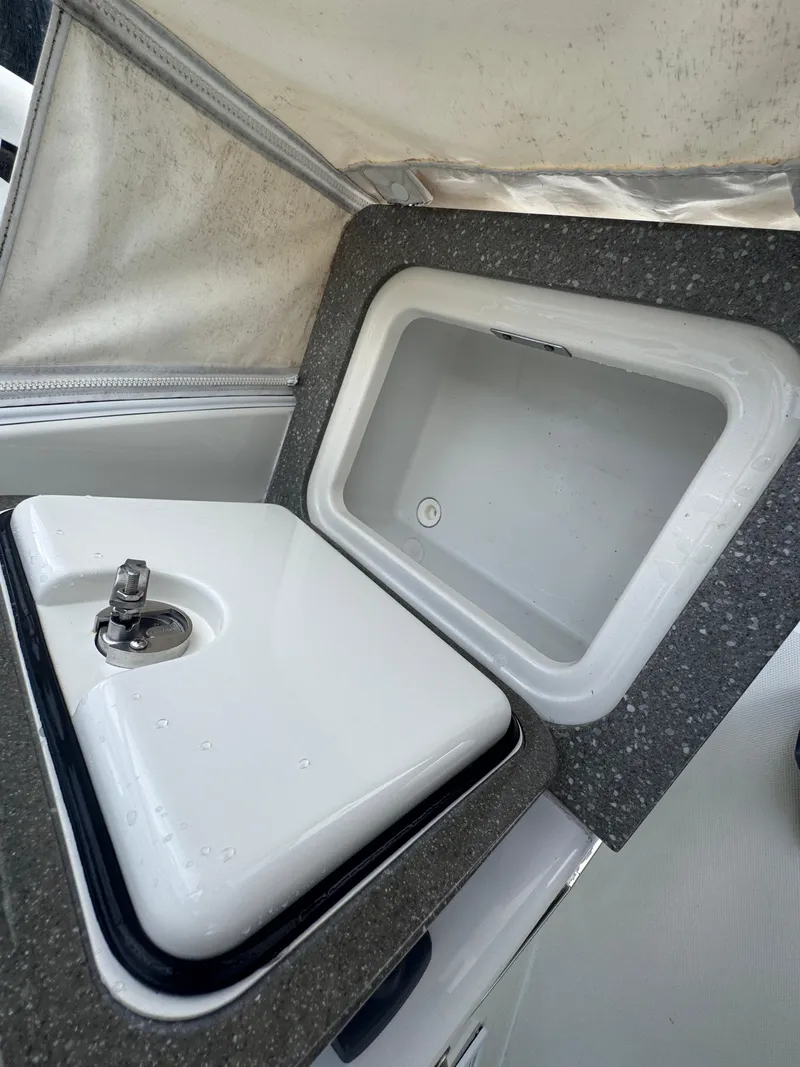 Slide: The Image of 2015 Boston Whaler 345 Conquest sink and countertop detail. - 35
