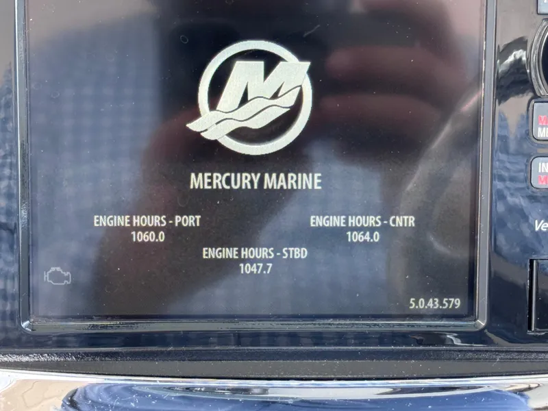 Slide: The Image of Mercury Marine display showing engine hours for 2015 Boston Whaler 345 Conquest. - 42
