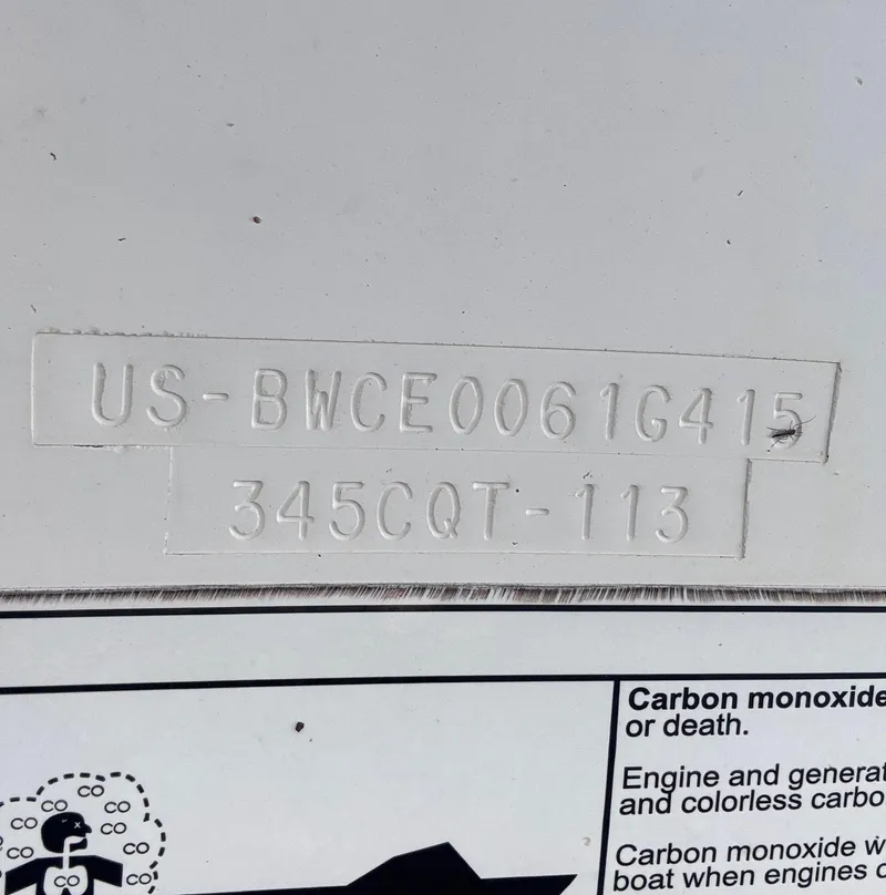 Slide: The Image of Hull identification number on a 2015 Boston Whaler 345 Conquest boat. - 46