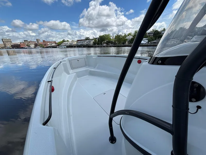 Slide: The Image of 2004 Baja 250 Sportfish boat on calm water under a partly cloudy sky. - 10