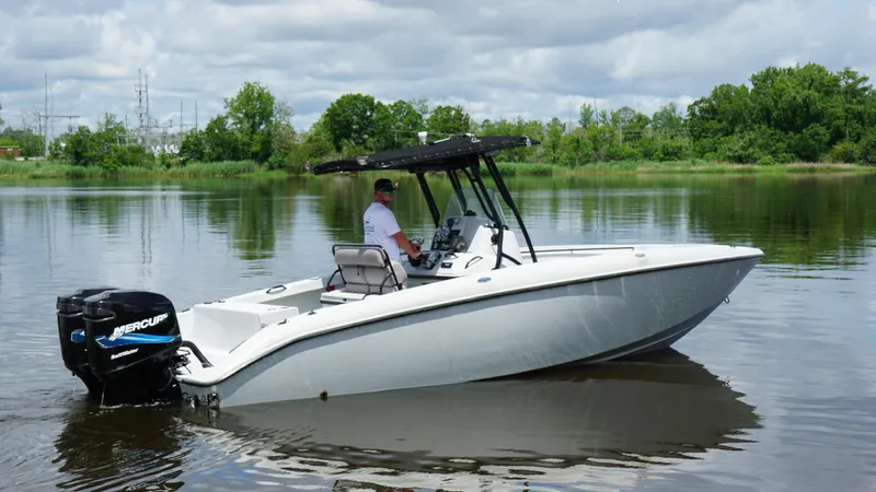 Slide: The Image of 2004 Baja 250 Sportfish boat on calm water with Mercury outboard motor. - 5